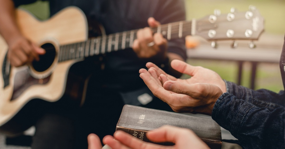 Hands raising in worship